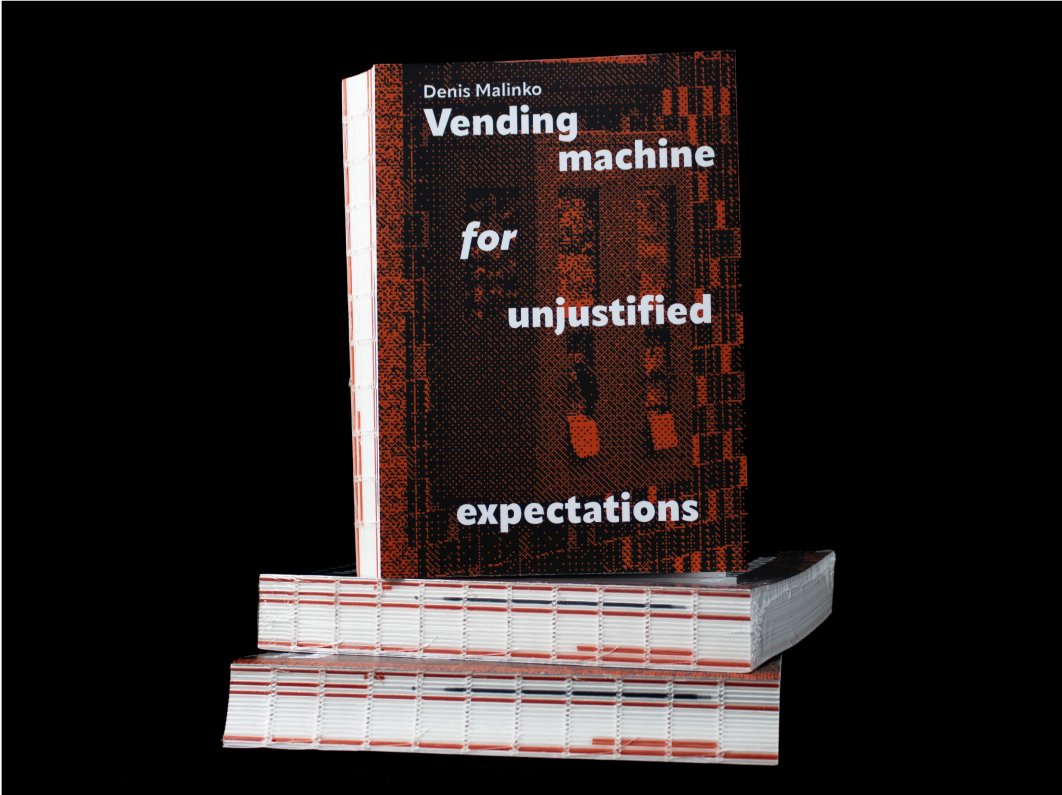 Stack of books with a bold, modern cover design on a white background
