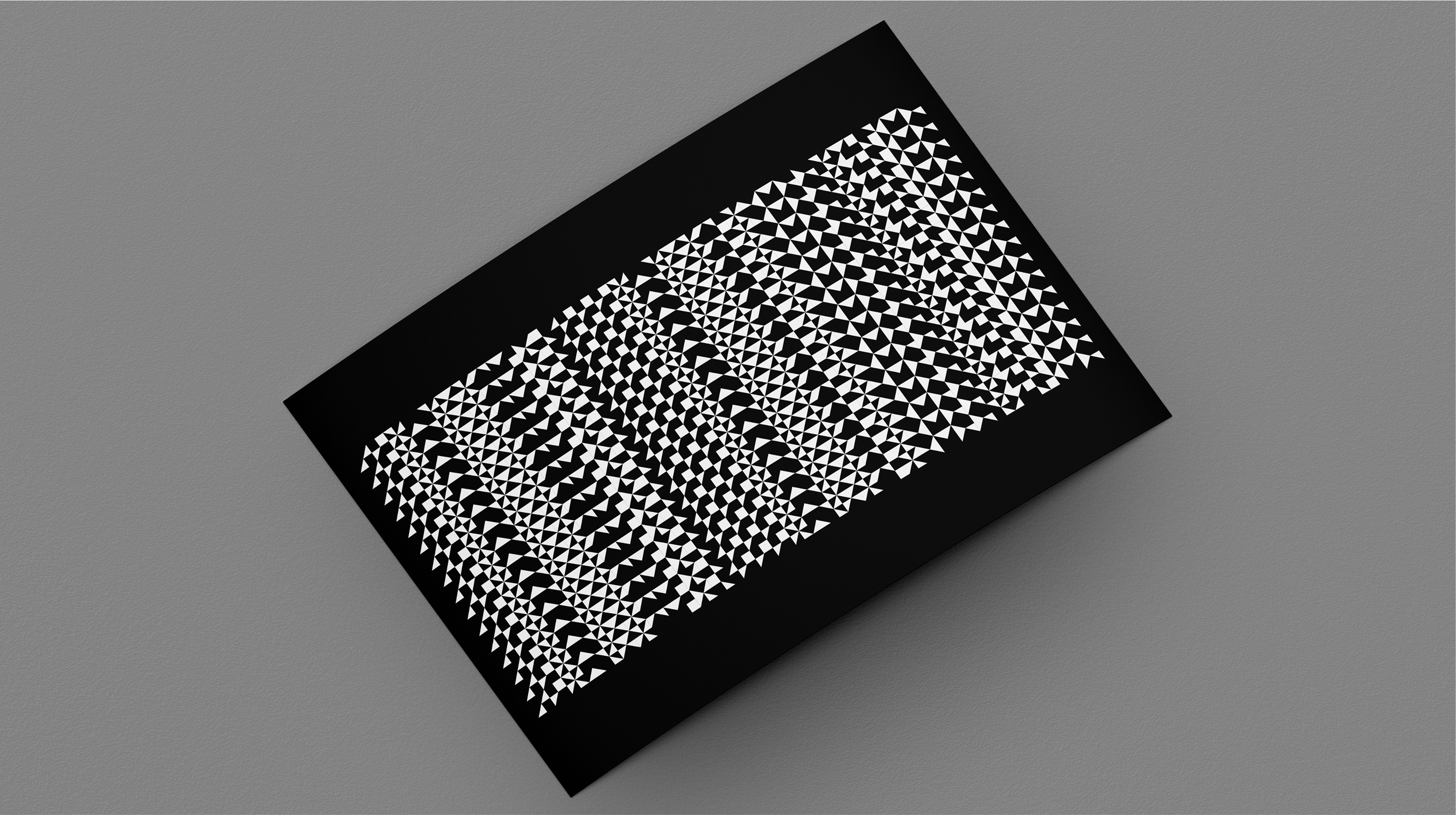 Black rectangular card with repeating white cipher pattern on gray background
