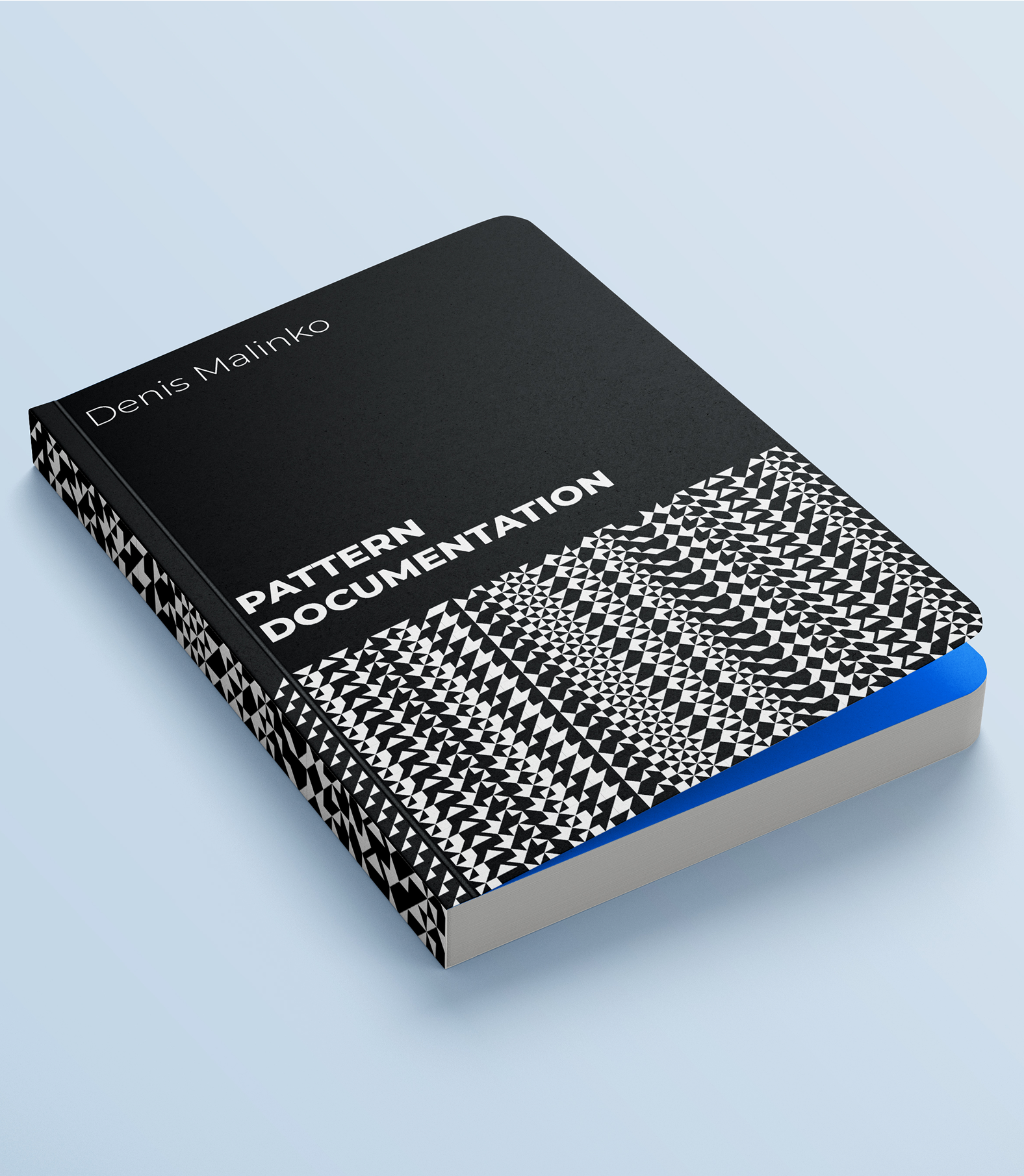 Book titled “Pattern Documentation” with dense cipher pattern on cover and spine
