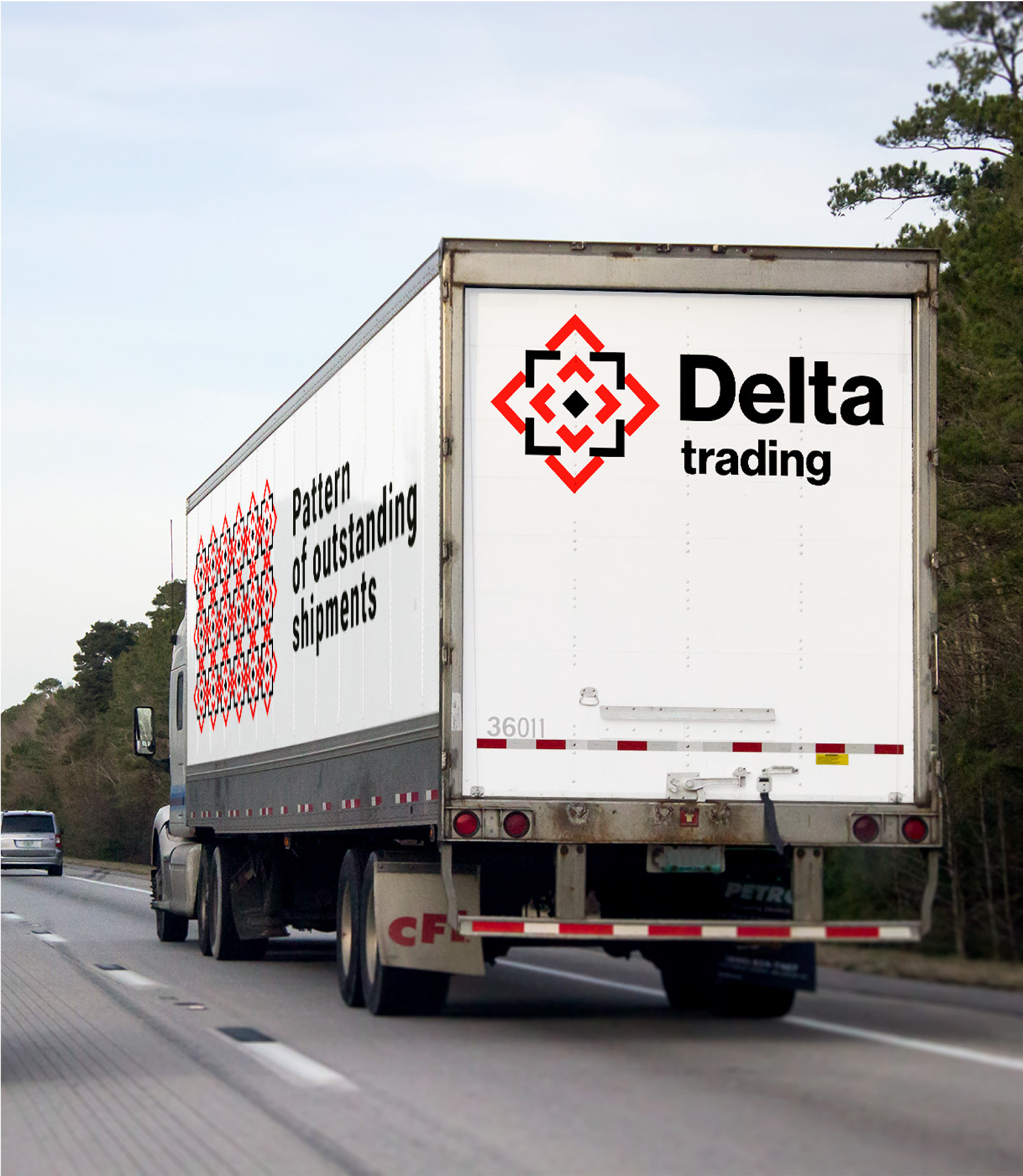 Delivery truck featuring Delta Trading logo and embroidery-inspired pattern