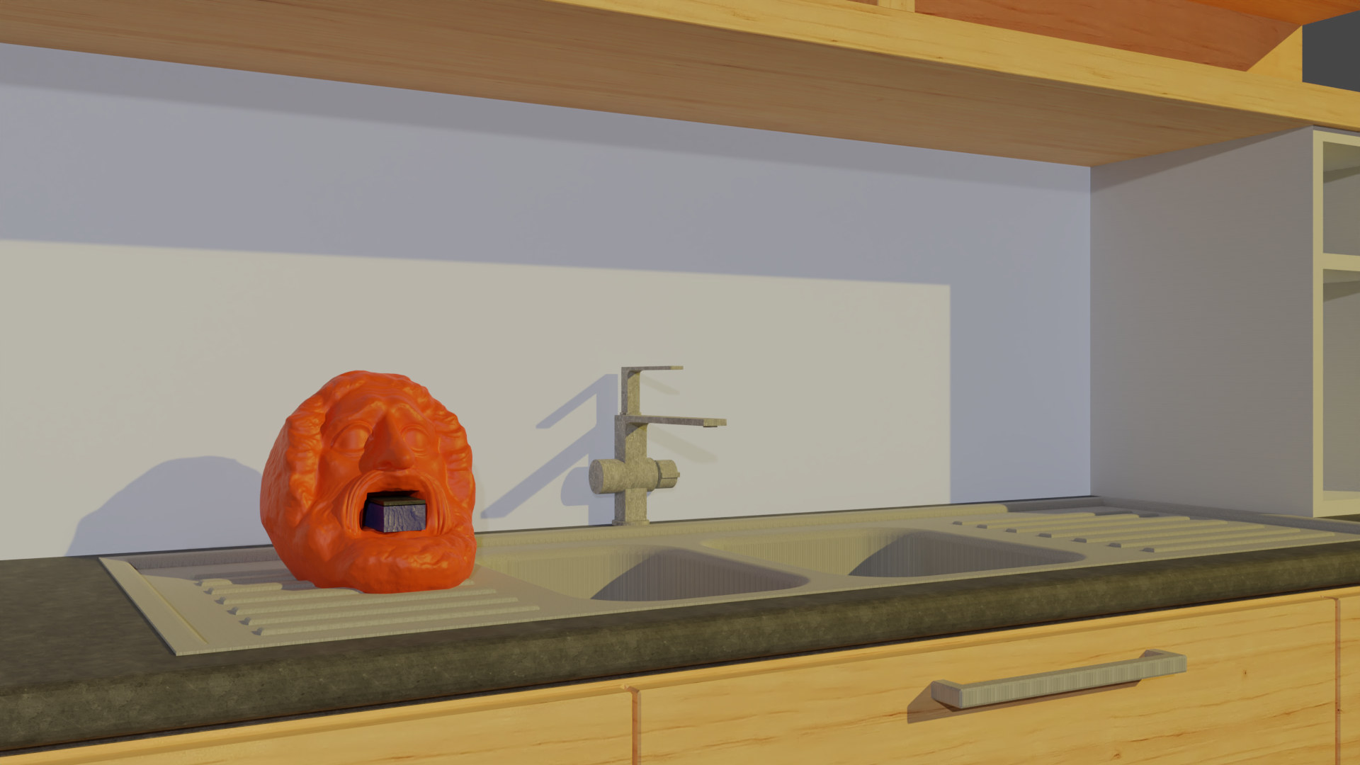Sponge holder placed on kitchen sink, holding a sponge in its open mouth