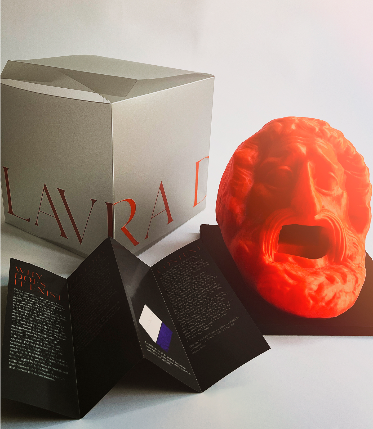 Unboxed sponge holder with packaging and folded info card