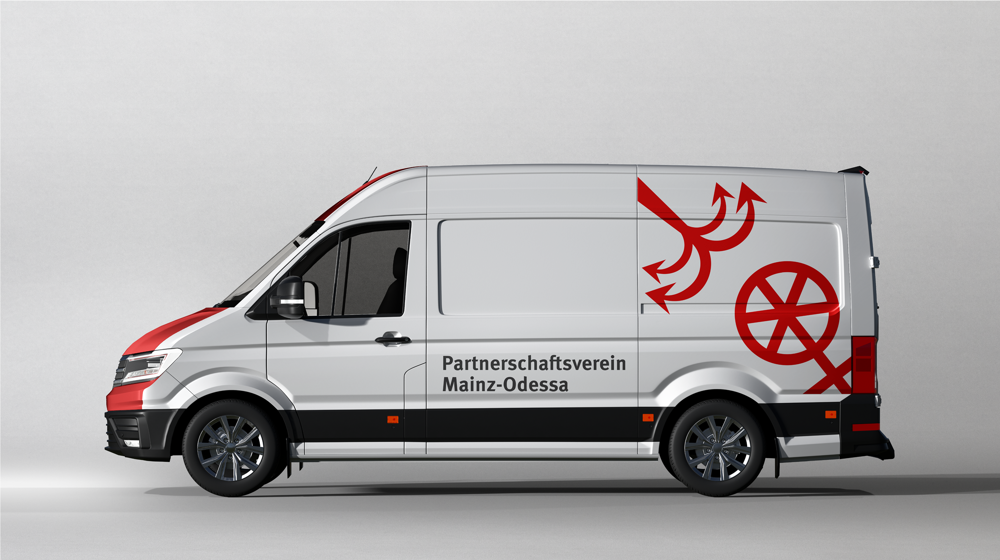 Van with Mainz–Odessa partnership logo featuring anchor and ship’s wheel