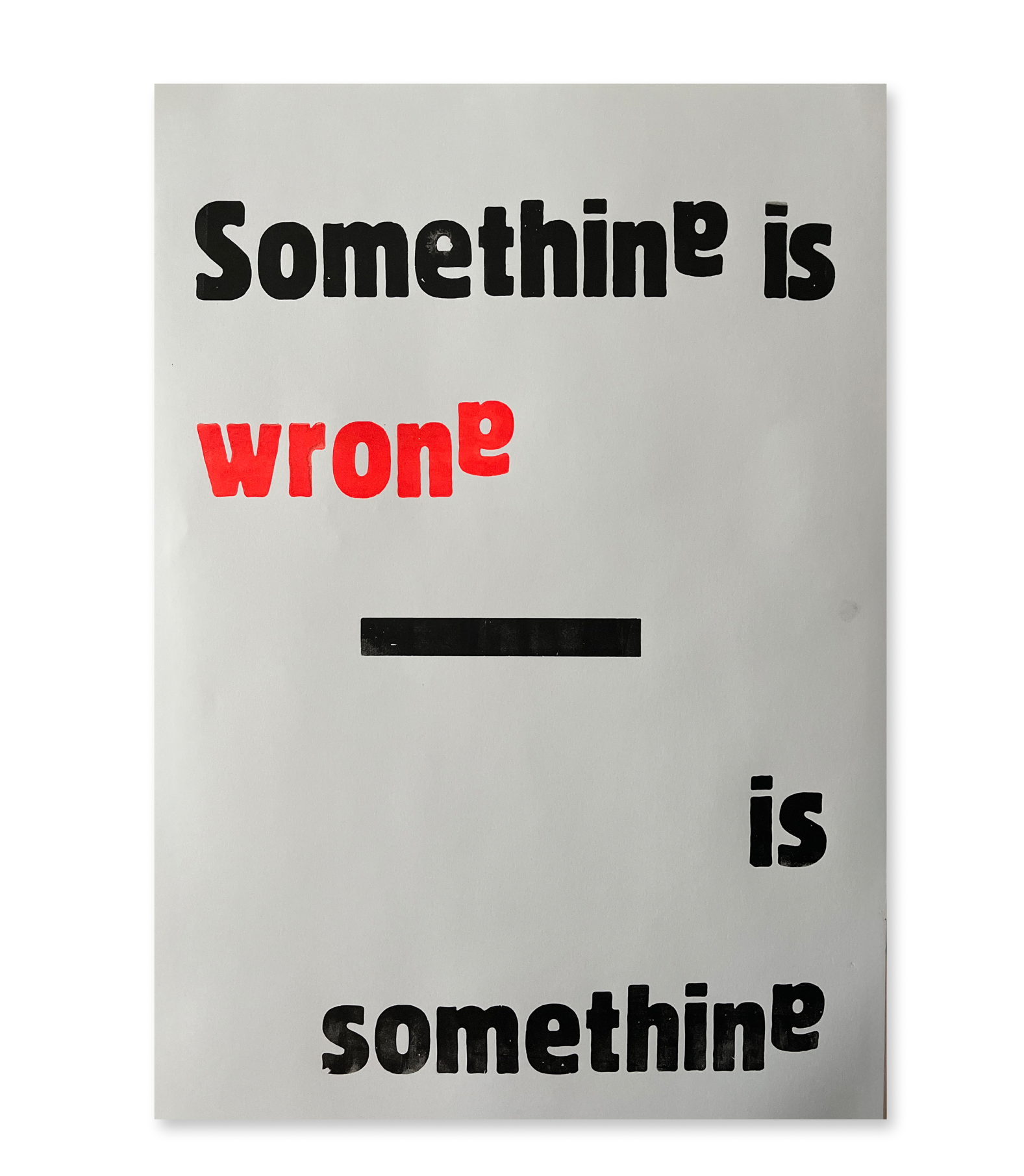 Black and red distorted type spells "Something is wrong" mirrored below